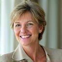 Smiling woman, Sarah L., 48, looking healthy and vibrant.